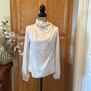 Gently used, long sleeve shirt, sheer material, with turtleneck top, size Small.
